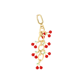 Gold charm with multiple red enamel cherries hanging from linked loops.