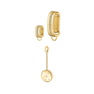 Dorne x Nuudii jewelry collaboration set, showcasing minimalist, modular gold pieces styled with a soft neutral-toned top for a chic beach-ready look.